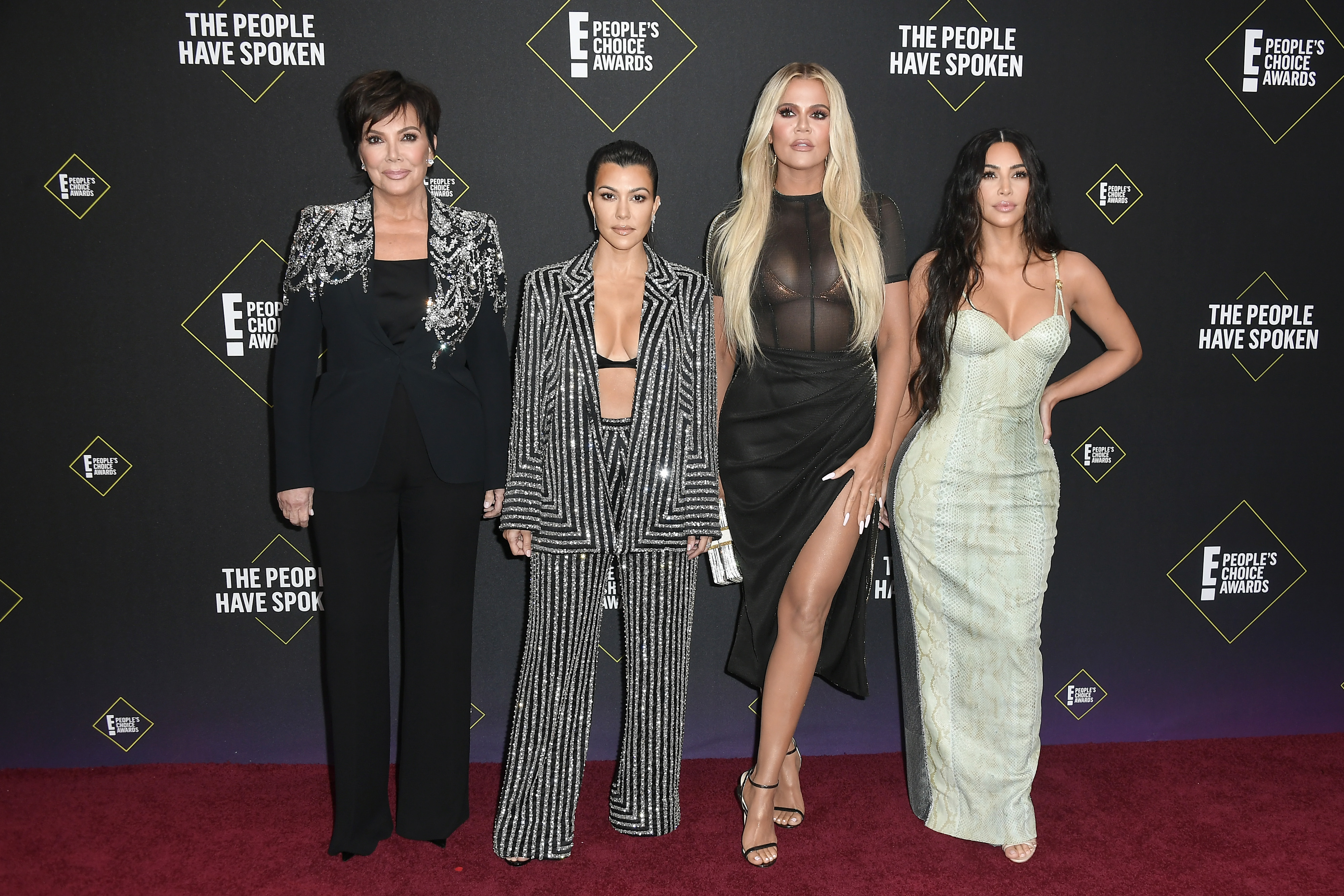 Kris, Kourtney, Khloe and Kim Kardashian at a premiere