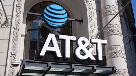 Closeup of AT&T sign at store.