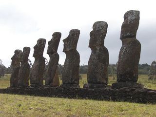 Giant statues called moai stand atop a stone platform called an ahu on Easter Island (Rapa Nui).