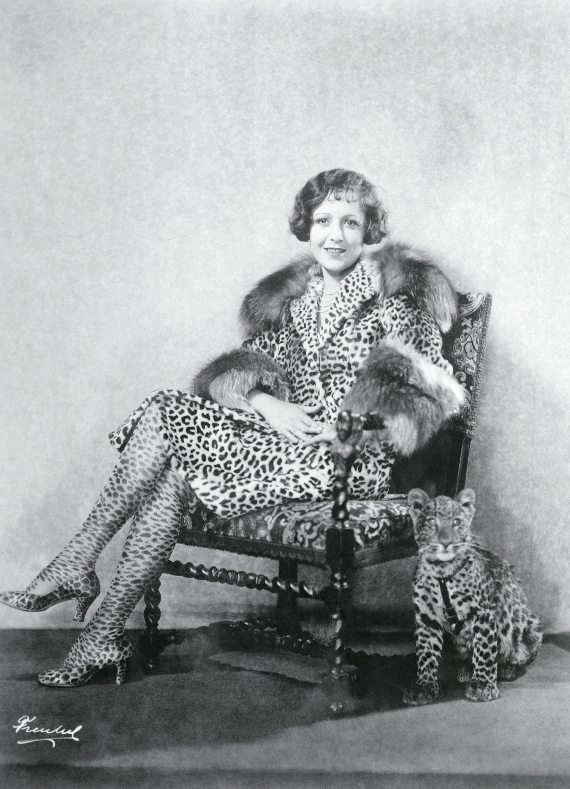 Lola Todd wears leopard Ferragamo shoes in 1925