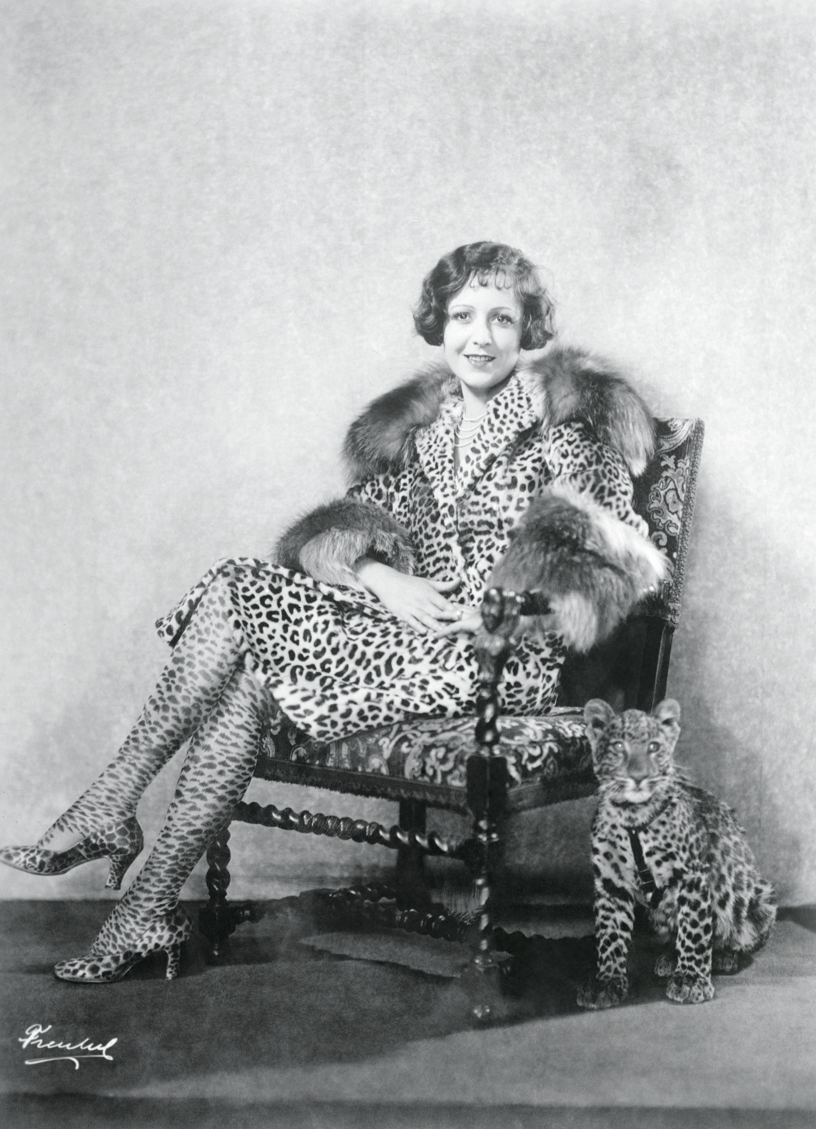 Lola Todd wears leopard Ferragamo shoes in 1925