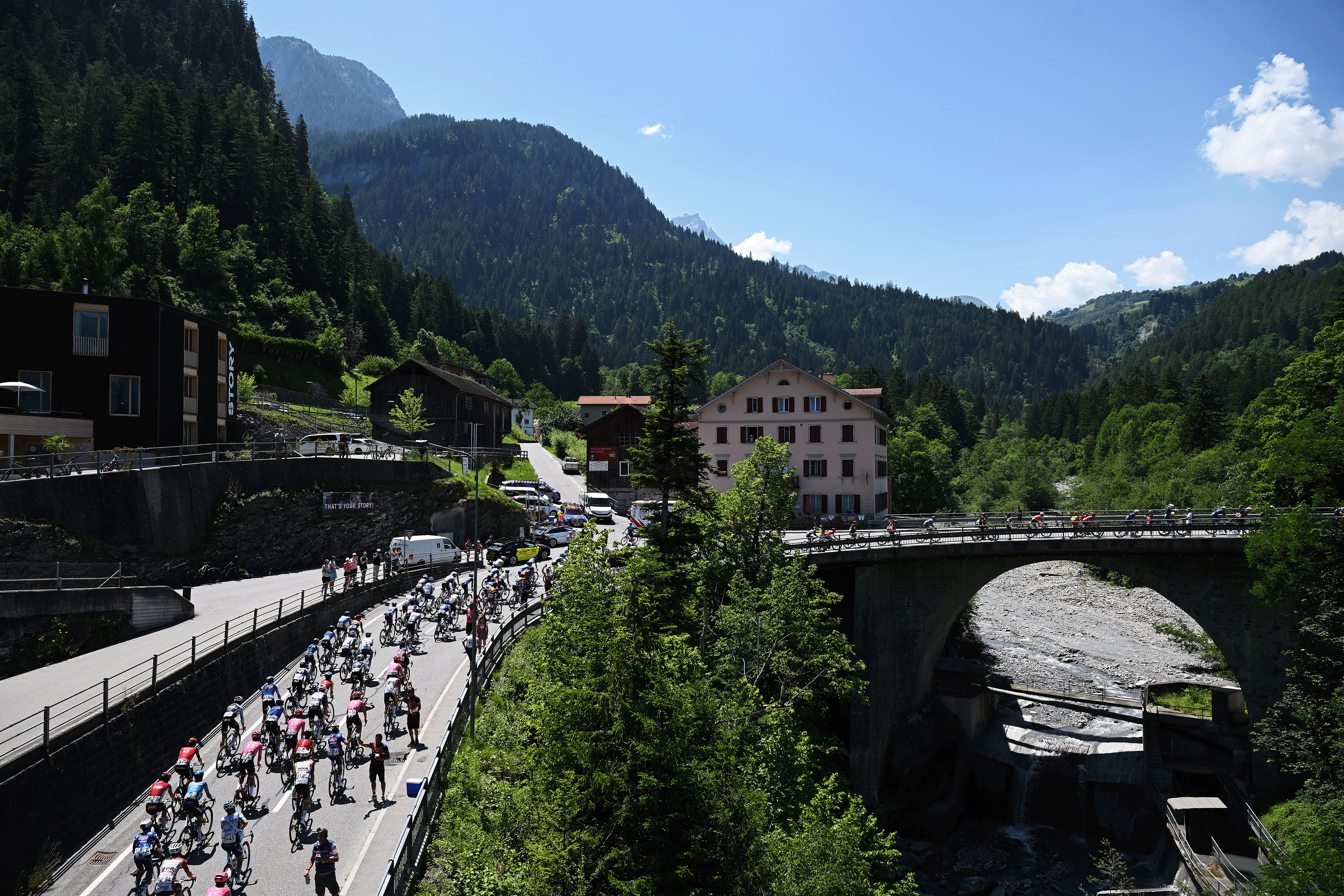 SANTA MARIA IN CALANCA, SWITZERLAND - JUNE 19: A general view of the peloton passing through a landscape during the 88th Tour de Suisse, Stage 5 a 183.8km stage from La Punt to Santa Maria in Calanca 941m / #UCIWT / on June 19, 2025 in Santa Maria in Calanca, Switzerland. (Photo by Tim de Waele/Getty Images)