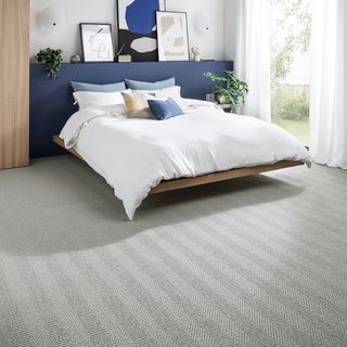 grey bedroom with grey carpet from Kersaint Cobb