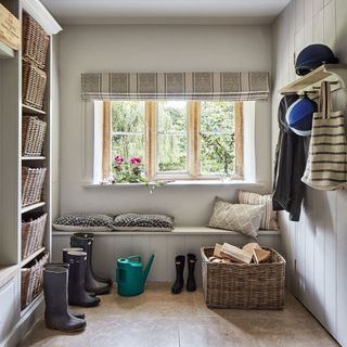 boot room with window and natural lighting