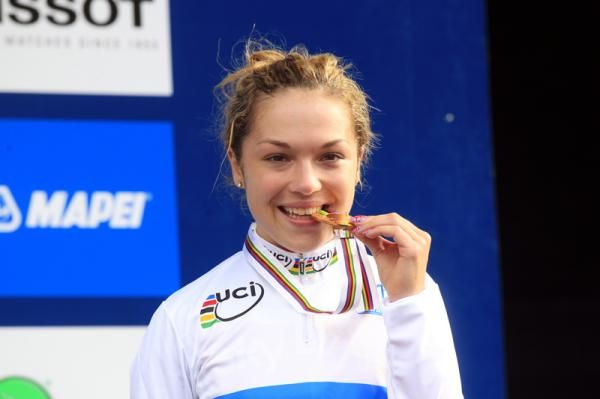 Garner (Great Britain) enjoying her gold medal