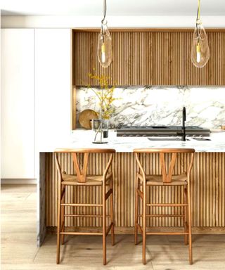 White kitchen with fluted wood details - Scandinavian design