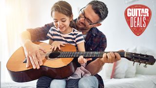 Man and daughter with acoustic guitar