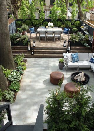 backyard decking creating zones for dining and seating