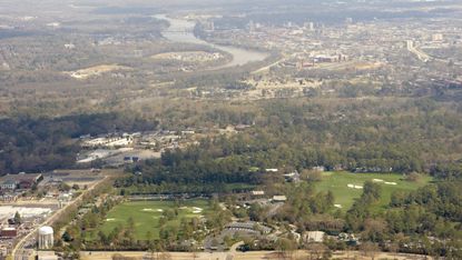 augusta national golf club with augusta city behind