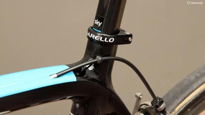 A little rubber ball keeps the rear brake housing from rubbing away the paint