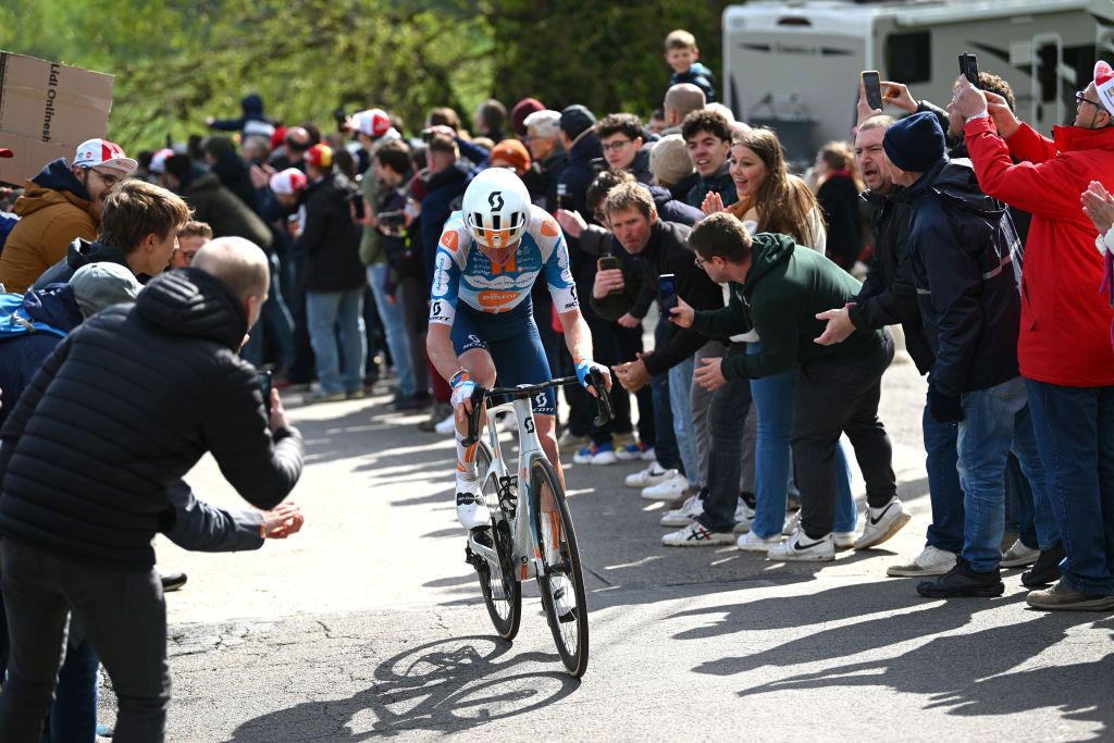 LIEGE BELGIUM APRIL 24 Romain Bardet of France and Team dsmfirmenich PostNL competes in the chase group while fans cheer during the 110th Liege Bastogne Liege 2024 Mens Elite a 2545km one day race from Liege to UCIWT on April 24 2024 in Liege Belgium Photo by Dario BelingheriGetty Images
