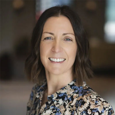 headshot of Angela Kerr a woman with mid-length dark hair