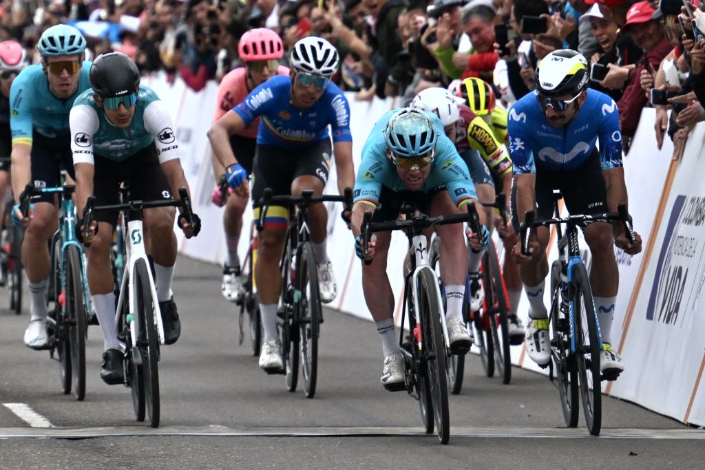 Great Britain's cyclist Mark Cavendish (2nd-R) of the Astana Qazaqstan team races to the finish line to win the fourth stage of the Tour Colombia UCI 2024 from Paipa to Zipaquira, Colombia, on February 9, 2024. (Photo by Luis ACOSTA / AFP)