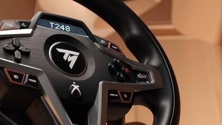 Thrustmaster T248 Racing Wheel and Magnetic Pedals closeup.