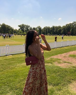 Woman wearing a football stadium outfit idea.