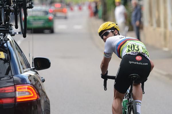 World champion Mark Cavendish (Sky) back in the race convoy.
