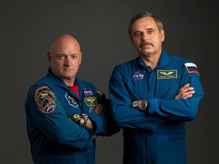 NASA astronaut Scott Kelly (left) and Russian cosmonaut Mikhail Kornienko began a yearlong mission to the International Space Station in March 2015.