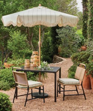 outdoor garden seating area styled with the Threshold™ designed with Studio McGee spring 2025 collection