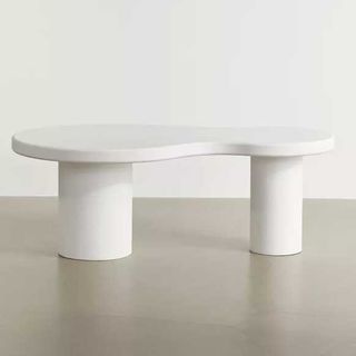 a white wavy coffee table