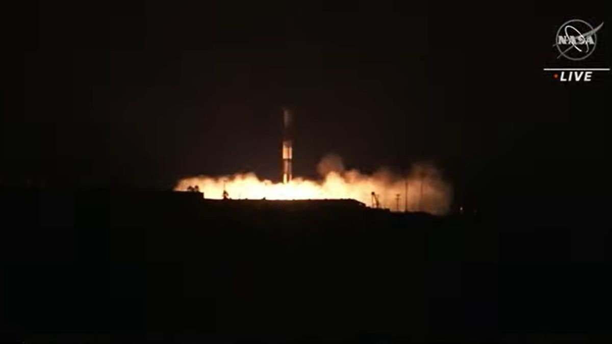 A SpaceX Falcon 9 rocket first stage booster touches down at Landing Zone 4 at the Vandenberg Space Force Base in California after launching NASA's Surface Water and Ocean Topography satellite on Dec. 16, 2022.