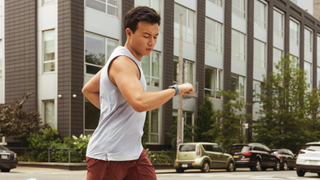 a man running with the Fitbit Versa 4
