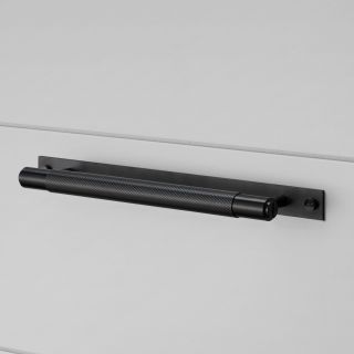 A black pull bar handle