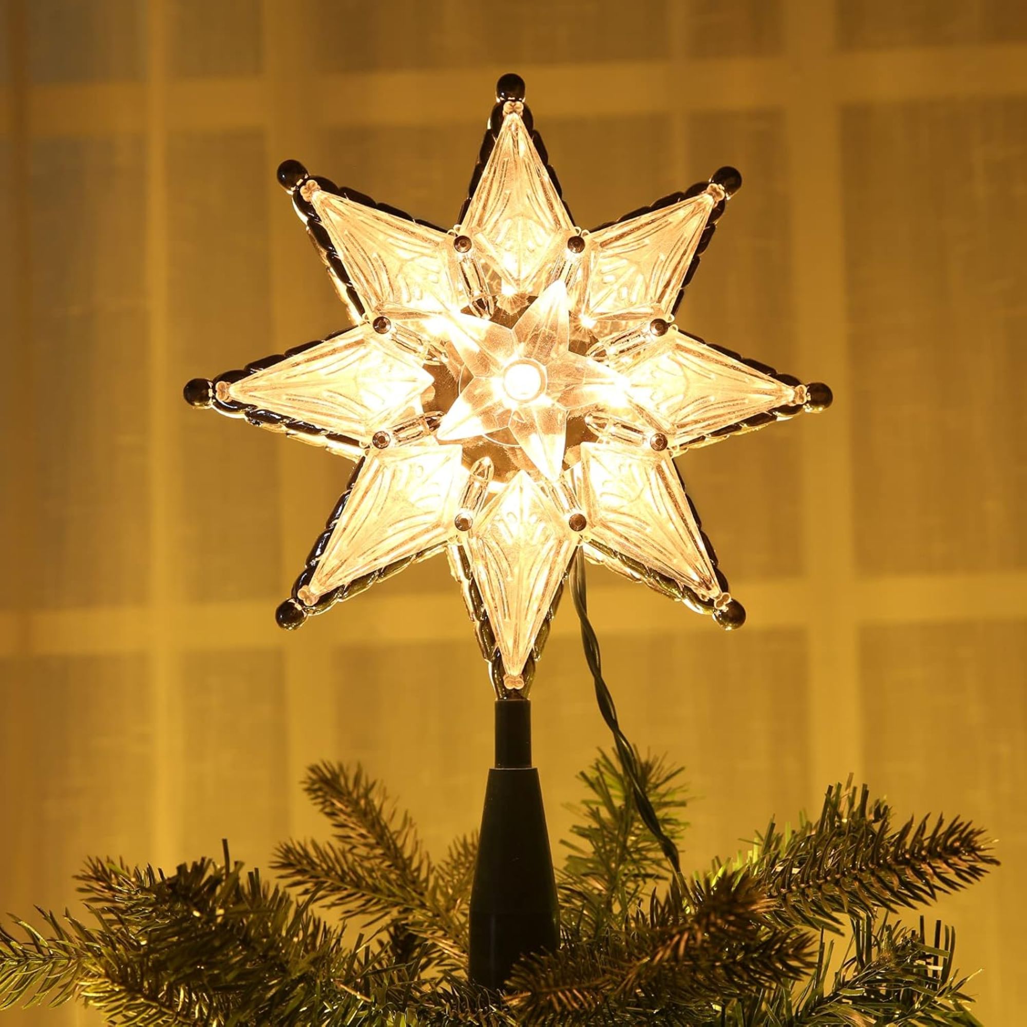 Star tree topper with black trim