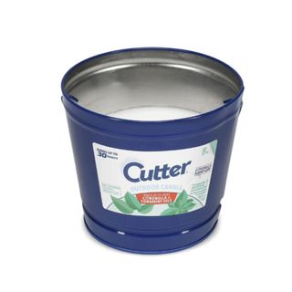 A candle in a dark blue container with a white label that says 'Cutter' in blue writing