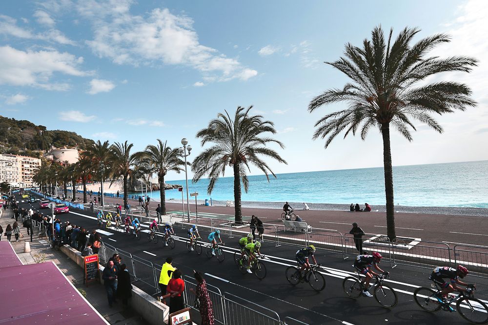 The pack rides on the 'Promenade des Anglais' during the finish of seven stage
