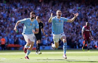 Phil Foden celebrates a goal for Manchester City