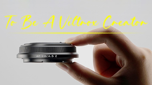 Hand holding Viltrox AF 28mm f/4.5 Z between fingers with yellow text &quot;To Be A Viltrox Creator&quot; 