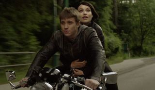 Tron Legacy Sam and Quorra riding on his motorcycle