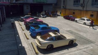 GTA 5 mods - a row of cars is parked in a parking lot