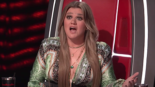 Screenshot of Kelly Clarkson looking shocked on The Voice