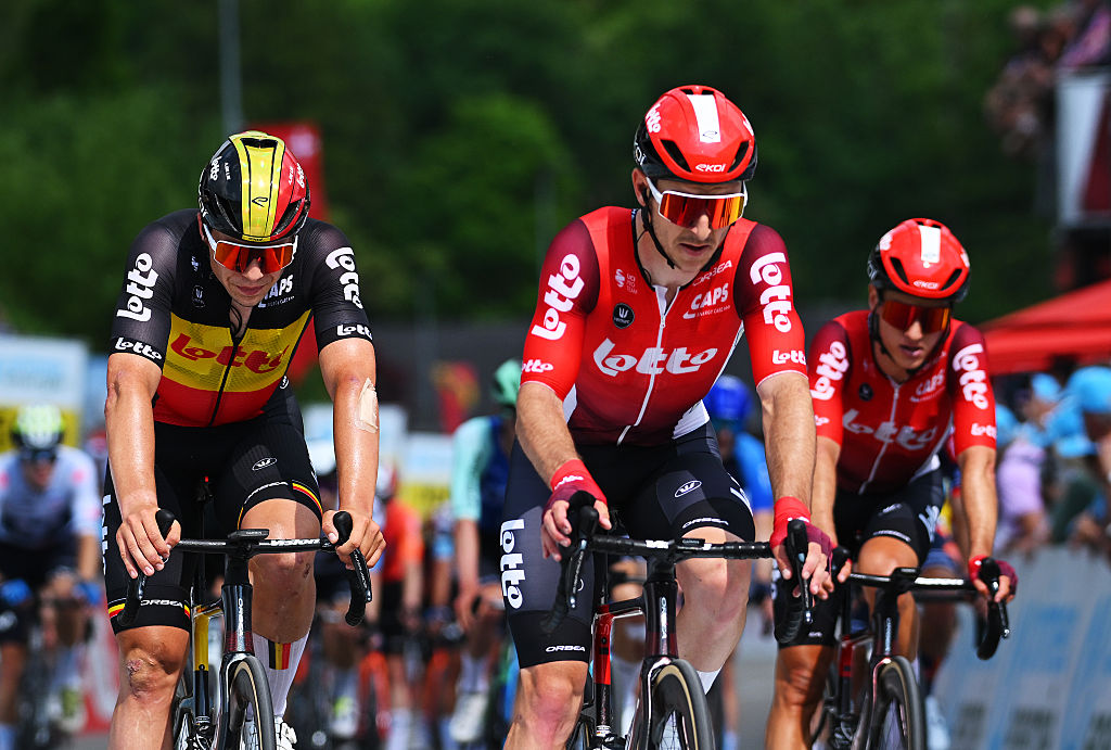 SCHWARZSEE, SWITZERLAND - JUNE 16: (L-R) Arnaud De Lie of Belgium and Jasper De Buyst of Belgium and Team Lotto cross the finish line during the 88th Tour de Suisse, Stage 2 a 177km stage from Aarau to Schwarzsee / #UCIWT / on June 16, 2025 in Schwarzsee, Switzerland. (Photo by Tim de Waele/Getty Images)