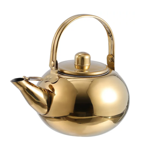A gold tea kettle