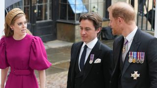 Prince Harry arrives with Princess Beatrice and Edoardo Mapelli Mozzi ahead of the Coronation of King Charles III and Queen Camilla