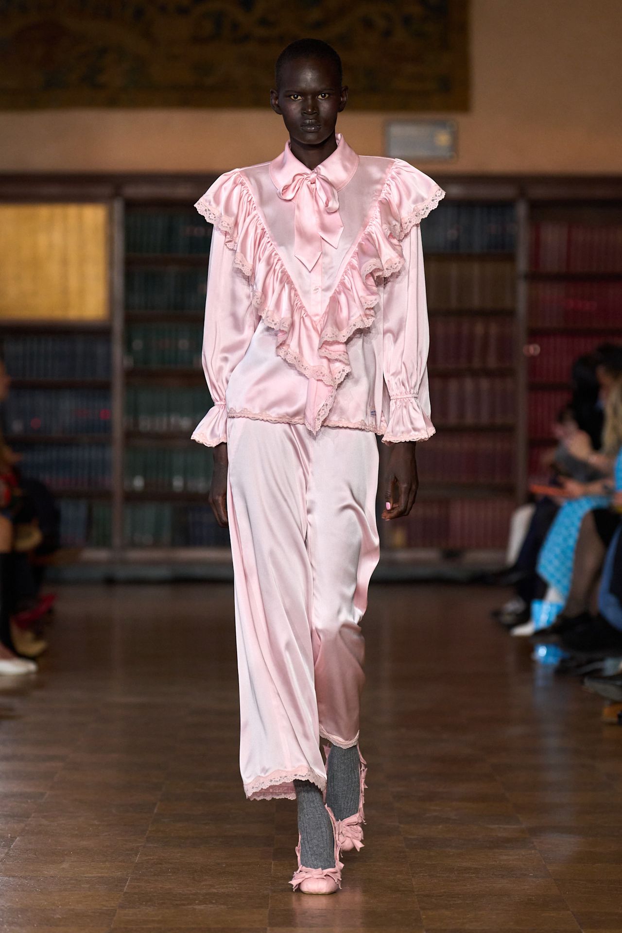 models walk the Sandy Liang Fall 2026 fashion show runway wearing slipper shoes
