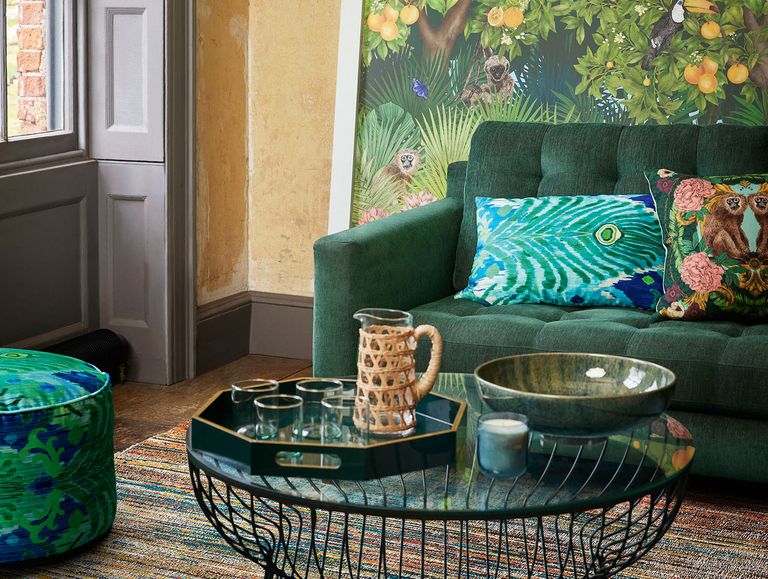 green sofa and patterned cushions by Matthew Williamson for John Lewis 