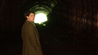 Jessie Buckley in a tunnel in Men.