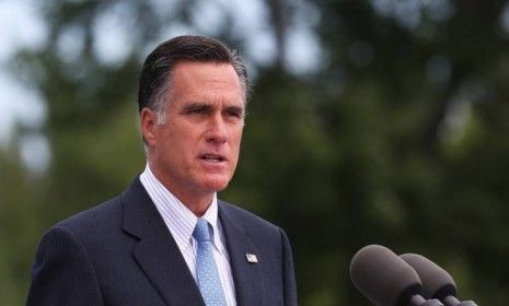 Mitt Romney speaks in New Hampshire on July 20: Romney&amp;#039;s campaign quickly disavowed a comment made by an anonymous adviser that seemed to paint President Obama as out of touch with the U.S.-B