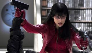 Ultraviolet Milla Jovovich battling in red leather