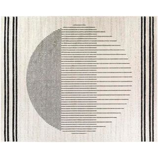 Black and ivory area rug with circular motif