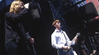 Josh Homme onstage with Screaming Trees in 1996