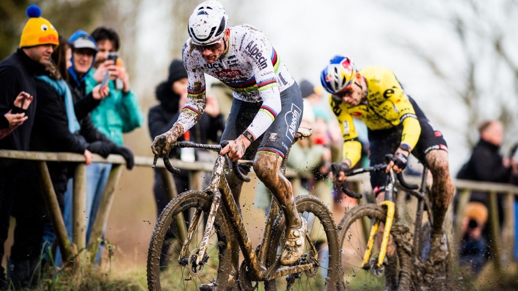 Dutch Mathieu Van Der Poel (L) and Belgian Wout van Aert compete during the men's elite race of the 'GP Sven Nys' cyclocross cycling event, stage 4 out of 8 of the X2O Badkamers 'Trofee Veldrijden' competition, in Baal on January 1, 2024.