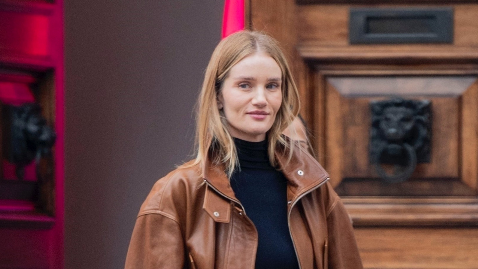 Rosie Huntington-Whiteley wearing a cognac leather jacket