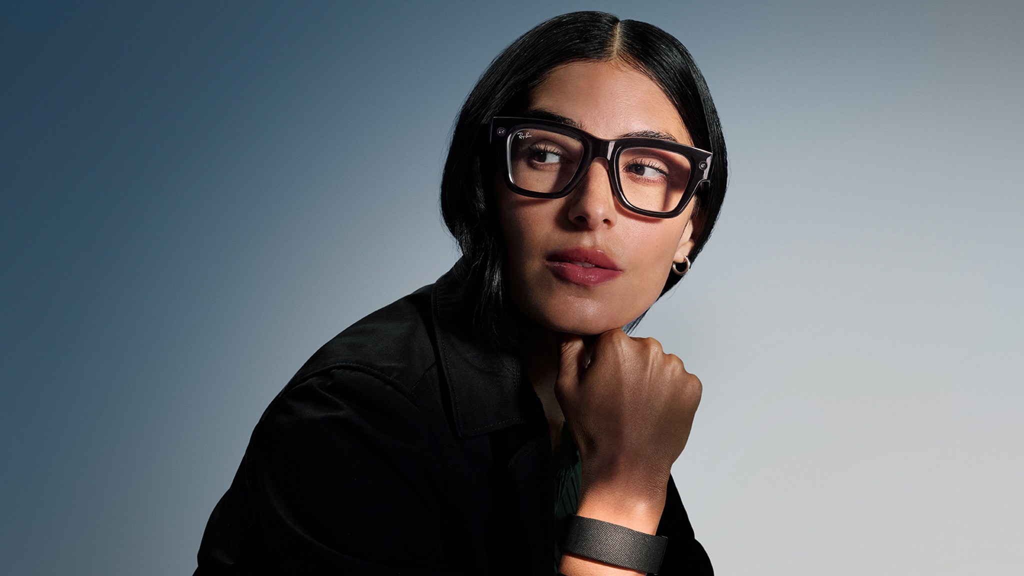 An official lifestyle shot of someone wearing Meta Ray-Ban Display Glasses