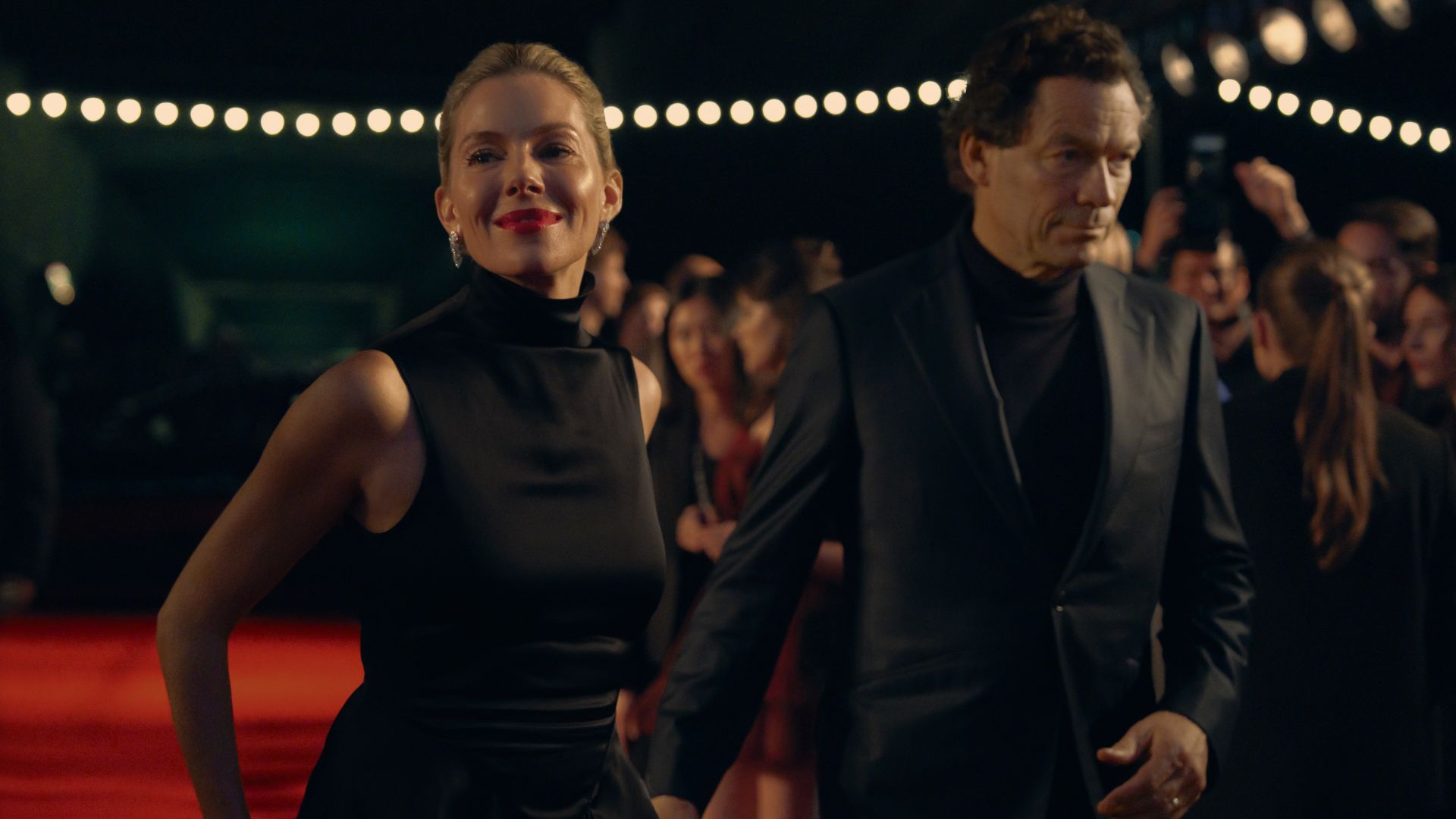 Sienna Miller as Carla Duval, Dominic West as Morgan Henderson in episode 1 of War