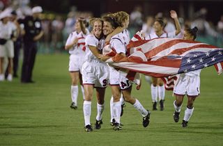 Team USA running and celebrating their win in the Women''s Soccer Finals during the 1996 Olympic Games in the Sanford Stadium in Athens, Georgia. The Women''s Team USA defeated the Women''s Team China 2-1. Mandatory Credit: David Cannon /Allsport