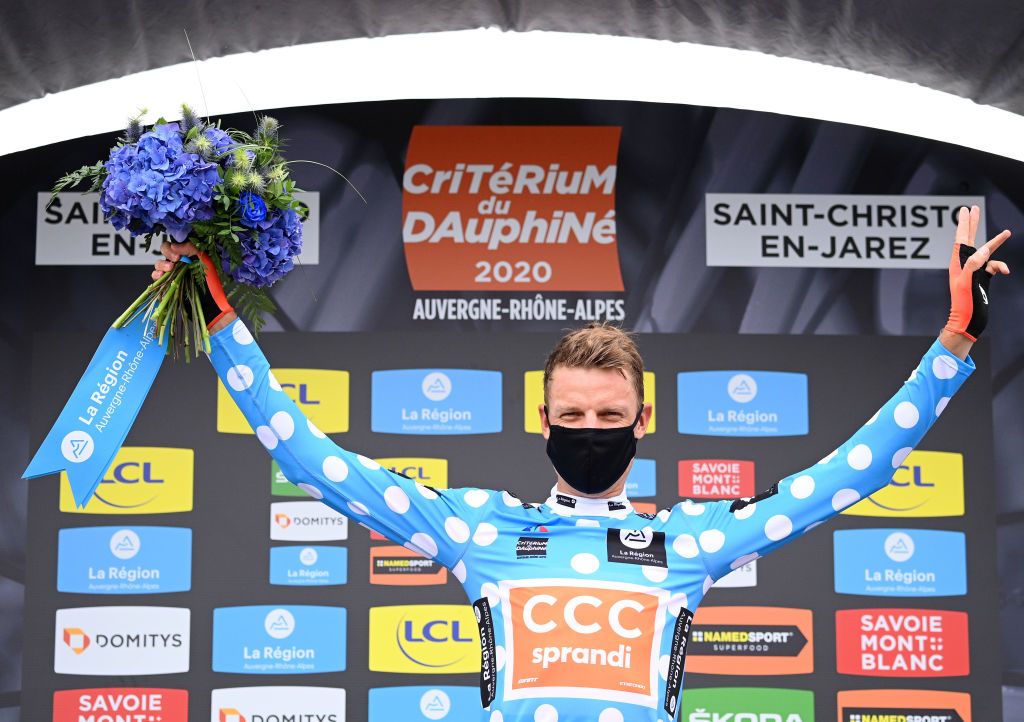 SAINT CHRISTO EN JAREZ FRANCE AUGUST 12 Podium Michael Schar of Switzerland and CCC Team Polka Dot Mountain Jersey Celebration Flowers Covid safety measures during the 72nd Criterium du Dauphine 2020 Stage 1 a 2185km stage from Clermont Ferrand to Saint Christo en Jarez 752m dauphine Dauphin on August 12 2020 in Saint Christo en Jarez France Photo by AnneChristine Poujoulat PoolGetty Images